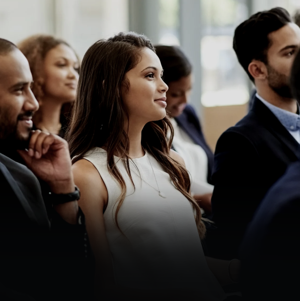 Group of persons listening a conference